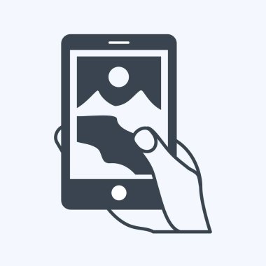 Resim çeken ikon. El Eylemleri sembolü için uygun. Kabartma tarzı. Basit dizayn edilebilir. tasarım şablonu. Basit gösterim