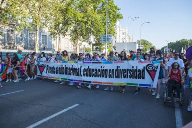 Madrid, Spain, July 09, 2022. Madrid Pride Parade 2022 with people walking along one of the main streets of the city. . High quality photo