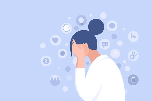 Yüzünü ellerle örten stresli bir kızın resmi.