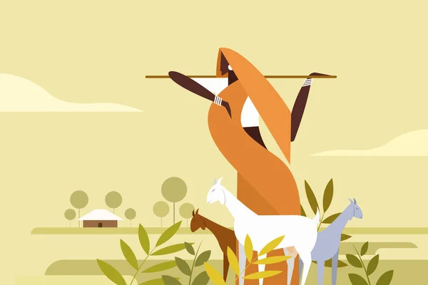 Çayırlarda keçi güden Hintli bir kırsal kadın tasviri