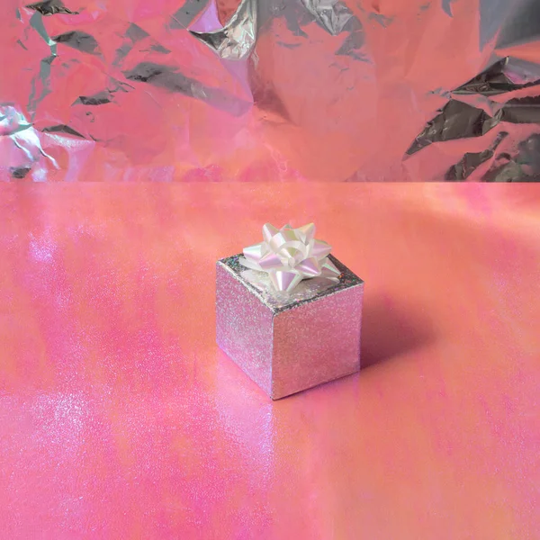 Modern Party Concept Sparkling Silver Gift Orange Pink Background Minimalistic — Stockfoto