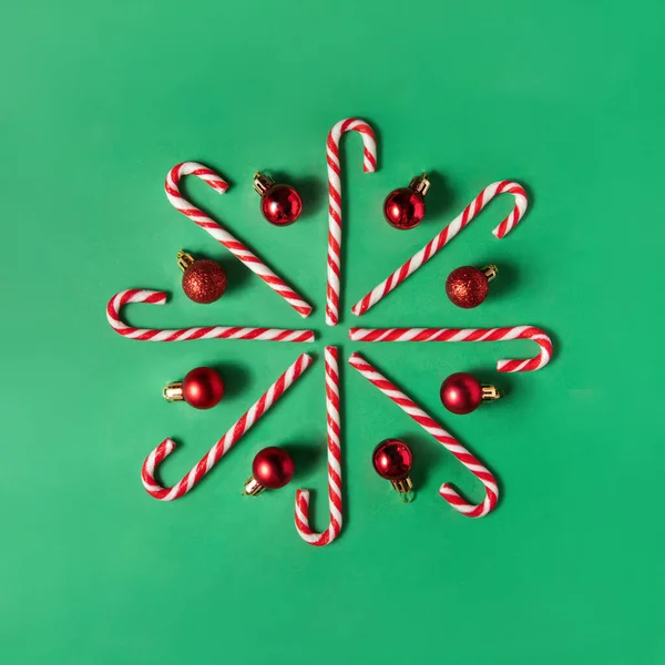 Candy Canes Red Baubles Green Background Snowflake Made Xmas Traditional — Stock Photo, Image