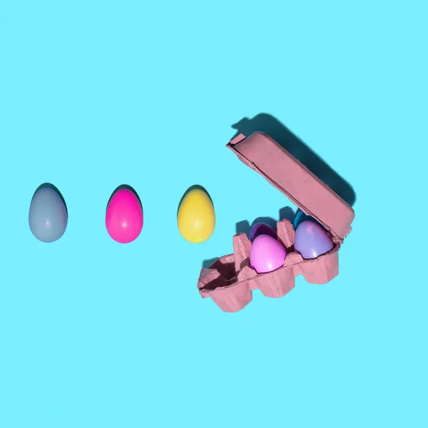 Colorful Pastel Eggs Carton Light Blue Background Creative Minimalistic Easter — Stockfoto