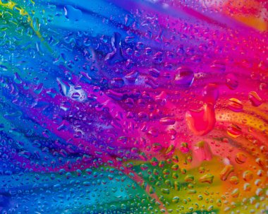 Soyut arkaplan. Yaratıcı modern renk karıştırma kavramı ile su damlaları.