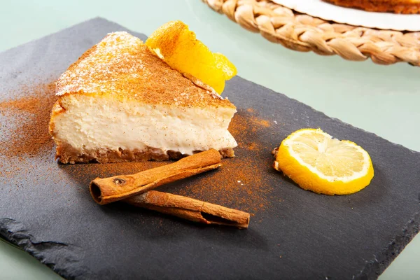 plating of a portion of lemon cheesecake. Still life.