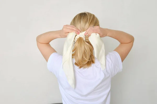 Rear View Woman Fixing Hair Ties Ribbon Her Hair - Stock-foto