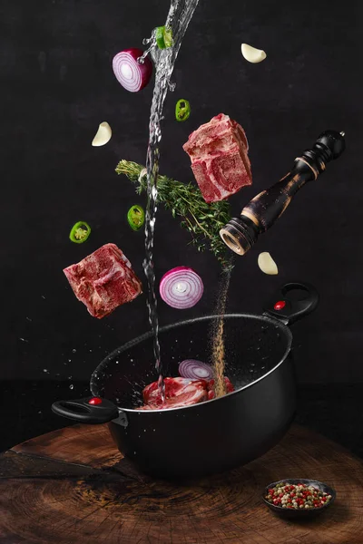 Chopped Beef Bones Falling Saucepan Ingredients Bouillon Stock Royalty Free Stock Images