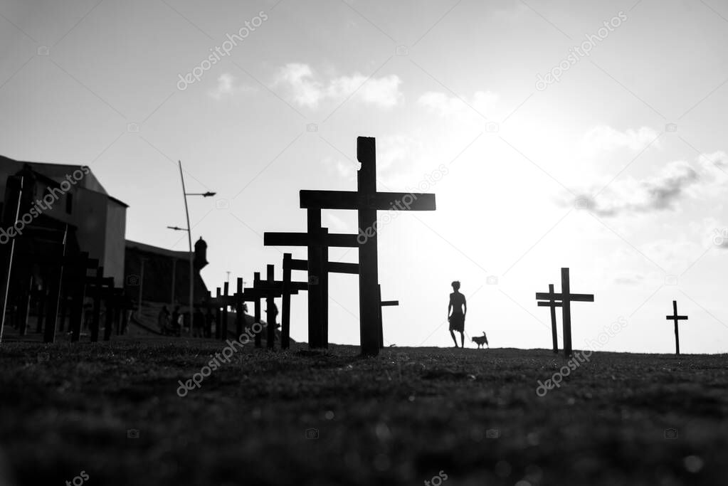 Crosses fixed to the ground in honor of those killed by Covid-19 at Farol da Barra in Salvador, Bahia, Brazil.