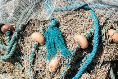 Detail of a fisherman's net on the ground. City of Salvador, capital of Bahia, Brazil.