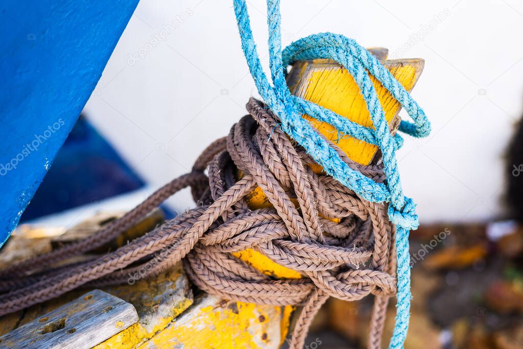 Detail of the tip of a boat with ropes tied. City of Salvador, Bahia, Brazil.