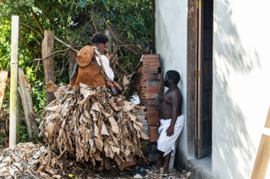 Santo Amaro, Bahia, Brazil - July 24, 2022: Members of the cultural event Nego Fugido prepare to perform in a theatrical way for the end of slavery in Acupe, Santo Amaro, Bahia.