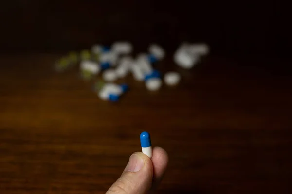 Simple Pile White Blue Yellow Pills Medicines Pills Stacked Brown — Foto Stock