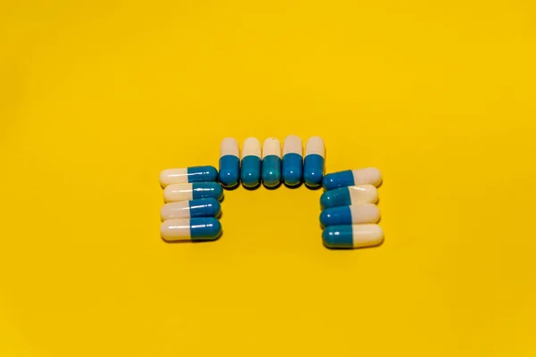 Blue White Colored Pills Arranged Blue Surface Medical Supplies — Foto Stock