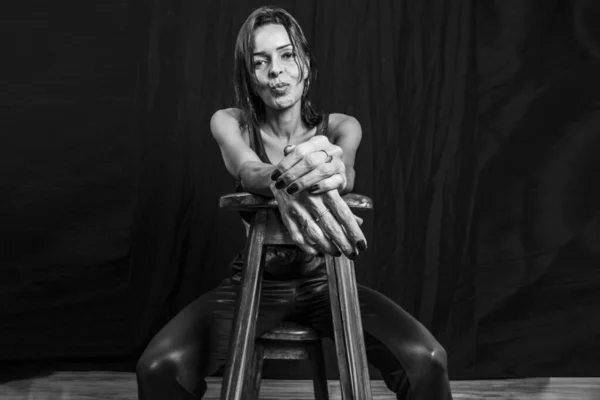 Black White Studio Portrait Young Woman Black Pants Shirt Sitting — Stok fotoğraf