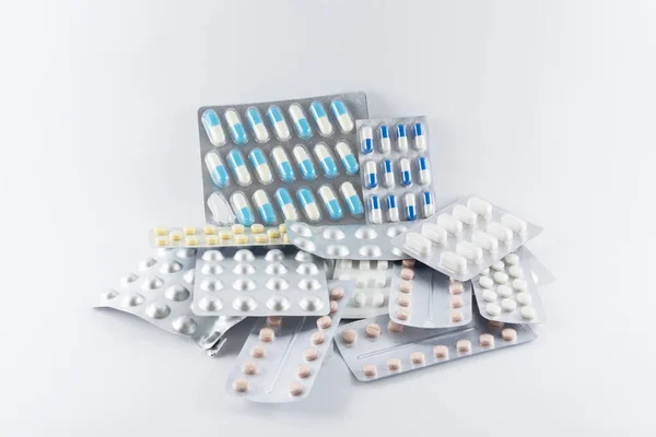 Carton Different Pills Medicines Pills Stacked White Background Medical Supplies — Fotografia de Stock