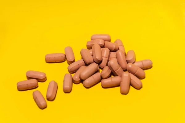 Several Brown Colored Pills Laid Out Top Blue Surface Medical — Stockfoto