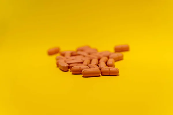 Several Brown Colored Pills Laid Out Top Blue Surface Medical — Foto Stock