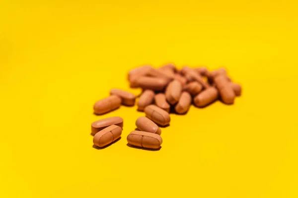 Several Brown Colored Pills Laid Out Top Blue Surface Medical — Photo