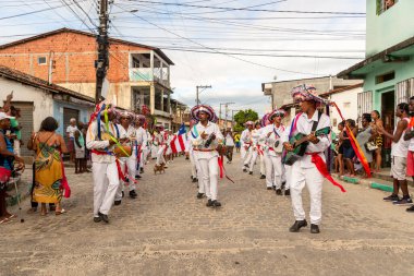 Saubara, Bahia, Brazil - August 06, 2022: Members of the Marujada de Curaca dance and sing at the Chegancas cultural meeting in Saubara, Bahia.