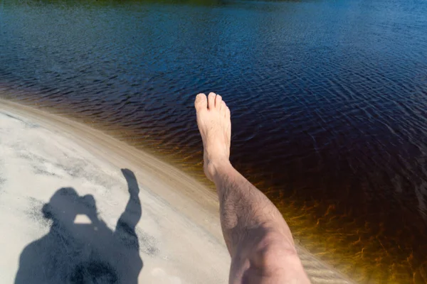 Photographer Displays His Shadow Leg Photo Sand Water River Background — Stok fotoğraf