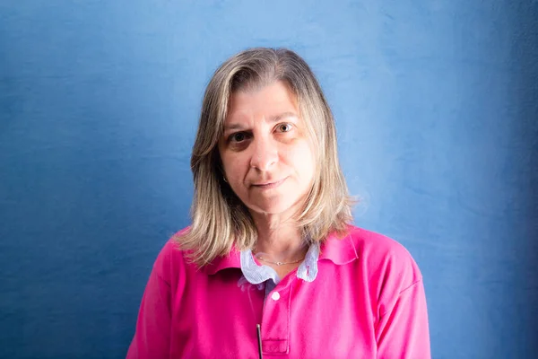 Studio Portrait Caucasian Woman Wearing Pink Shirt Blue Background Medical — Foto de Stock