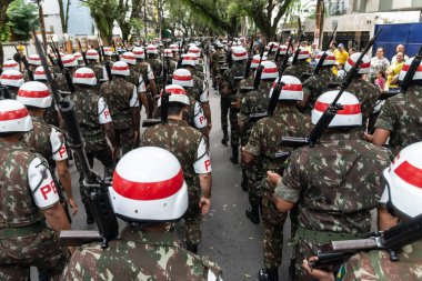 Salvador, Bahia, Brazil - September 07, 2022: Soldiers of the Brazilian army parading on independence day through the streets of downtown Salvador, Bahia.