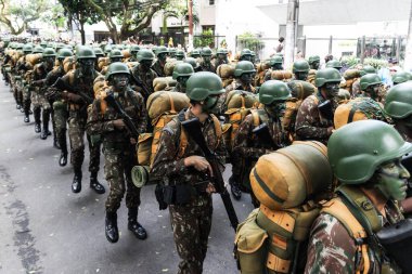 Salvador, Bahia, Brazil - September 07, 2022: Soldiers of the Brazilian army parading on independence day through the streets of downtown Salvador, Bahia.