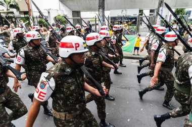 Salvador, Bahia, Brazil - September 07, 2022: Soldiers of the Brazilian army parading on independence day through the streets of downtown Salvador, Bahia.
