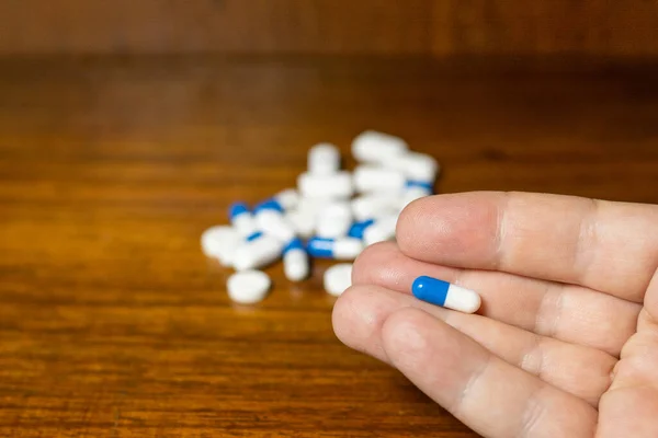 Simple Pile White Blue Yellow Pills Medicines Pills Stacked Brown — Foto Stock
