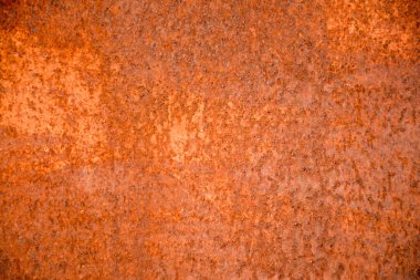 Güzel, eski paslı arka plan Çelik güneşe ve yağmura maruz kalır ve paslanmasına neden olur.