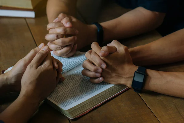 Christian Bible Study Concepts. Group of Christian read and study the bible together in a home. followers are studying the word of God and worship in church