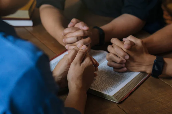 Christian Bible Study Concepts. Group of Christian read and study the bible together in a home. followers are studying the word of God and worship in church