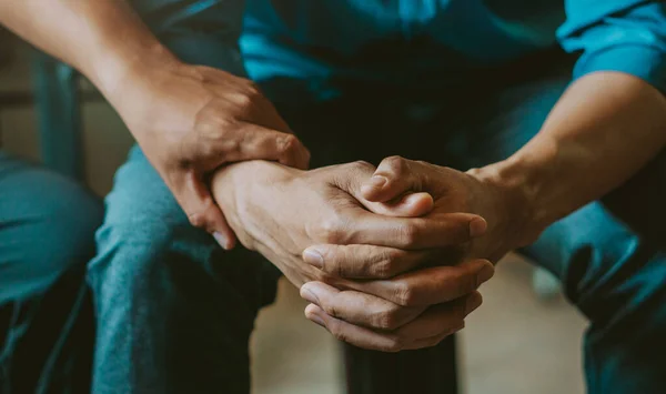 Stressed man in a consultation with a professional psychologist listens to advice on improving behavior in life.depression, stress, irritability, and life problems.