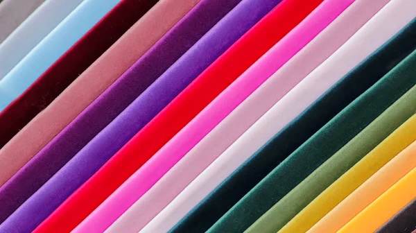 Colorful background, A stack of colorful fabric.Full frame shot of muti colored fabric background
