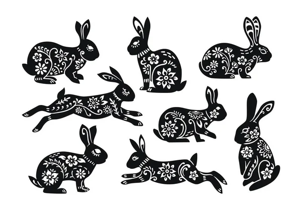 Beyaz arka planda izole edilmiş Paskalya tavşanı dekorasyonları.