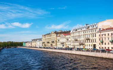 River channel with boats in Saint-Petersburg. Saint Petersburg panorama with canals, historic buildings and beautiful architecture. Russia. Spring time. Travel inspiration.
