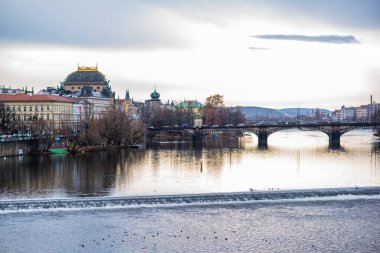 Scenic view of the Old Town architecture over Vltava river in Prague, Czech Republic.Scenic view of the Old Town architecture over Vltava river in Prague, Czech Republic.