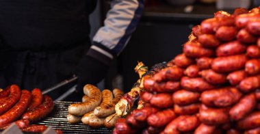 Grilled sausages. Traditional European street food. Stall selling food at the street in Vienna.