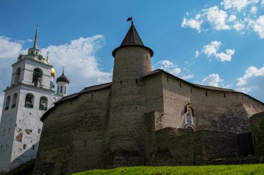 Medieval fortress tower. Ancient castle. Historical and architectural center of the 12th century in the old city, Russia. Medieval fortress and temple complex. Travel summer tourism holiday vacation.