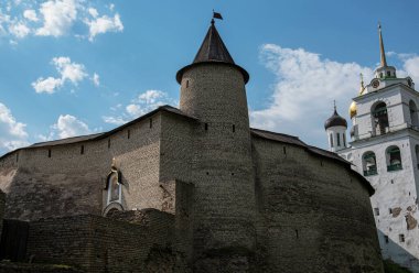 Medieval fortress tower. Ancient castle. Historical and architectural center of the 12th century in the old city, Russia. Medieval fortress and temple complex. Travel summer tourism holiday vacation.