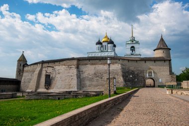 Medieval fortress tower. Ancient castle. Historical and architectural center of the 12th century in the old city, Russia. Medieval fortress and temple complex. Travel summer tourism holiday vacation.