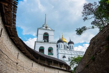 Medieval fortress tower. Ancient castle. Historical and architectural center of the 12th century in the old city, Russia. Medieval fortress and temple complex. Travel summer tourism holiday vacation.