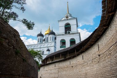 Medieval fortress tower. Ancient castle. Historical and architectural center of the 12th century in the old city, Russia. Medieval fortress and temple complex. Travel summer tourism holiday vacation.