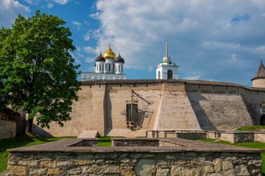 Medieval fortress tower. Ancient castle. Historical and architectural center of the 12th century in the old city, Russia. Medieval fortress and temple complex. Travel summer tourism holiday vacation.