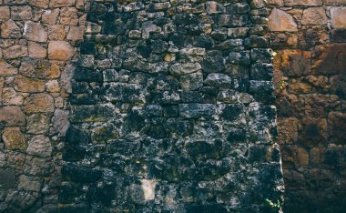 Medieval cathedral stone wall texture. Background of stone castle wall.