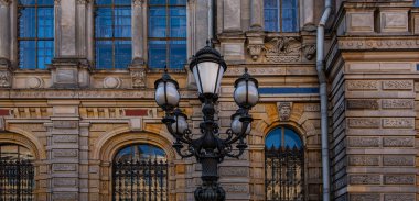 Vintage building facade wall. Rounded windows. Classic architecture historic buildings of St. Petersburg. Vintage toned image.