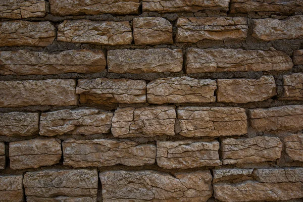 旧的棕色石墙石墙纹理 中世纪城墙上的旧砖块 外面的历史建筑 农村背景 图形纹理元素 — 图库照片
