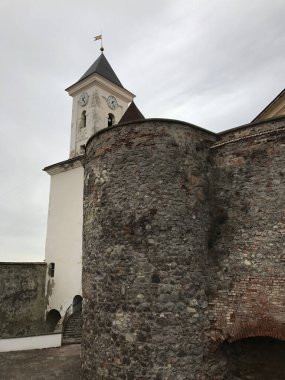Ancient fortress tower wall view. Medieval fortress tower view. Ancient medieval castle view. Medieval castle. Vintage tone filter effect with noise and grain.