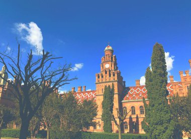 Ancient fortress tower wall view. Medieval fortress tower view. Ancient medieval castle view. Medieval castle. Vintage tone filter effect with noise and grain.