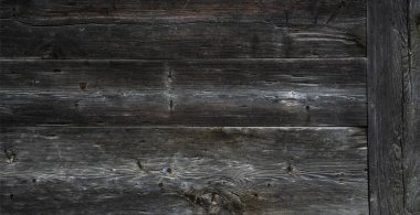 Dikensiz ahşap arka plan ve doku için eski koyu renk ahşap duvar. Kırsal ahır ahşap arka planda düğümler ve çiviler.